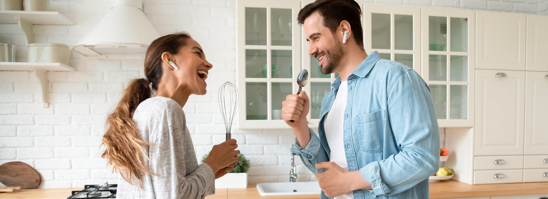 2 men using M2 Two-way Translation Earbuds
